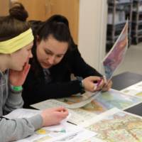 Students working on maps